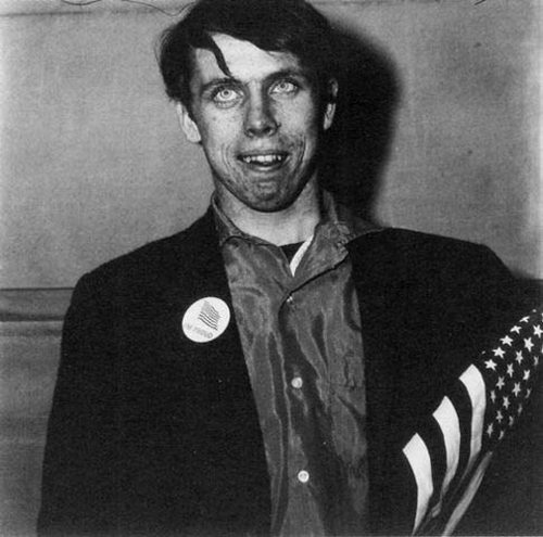 diane-arbus-patriotic-young-man-with-a-flag-1967-diane-arbus1-web_